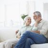 An old elderly retired couple sitting peacefully